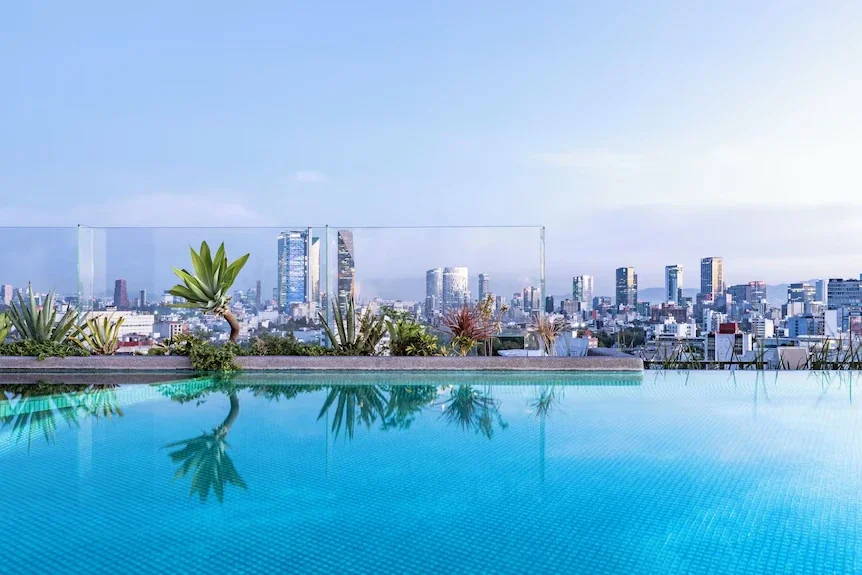 The hotel’s rooftop pool, looking out over the Mexico City skyline