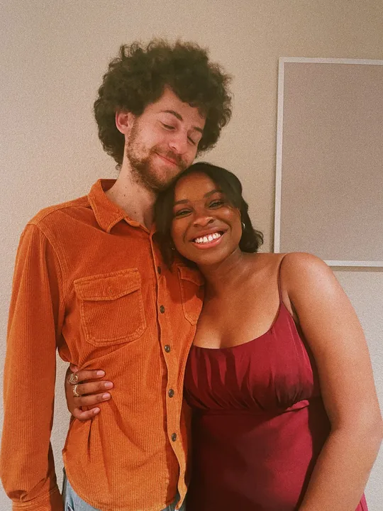 Cooper and Ciera smiling together, arm in arm