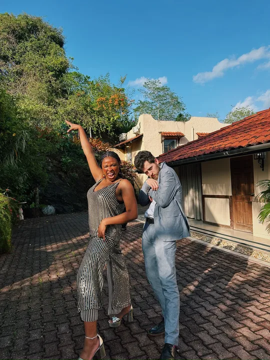 Ciera and Cooper dancing on a brick patio