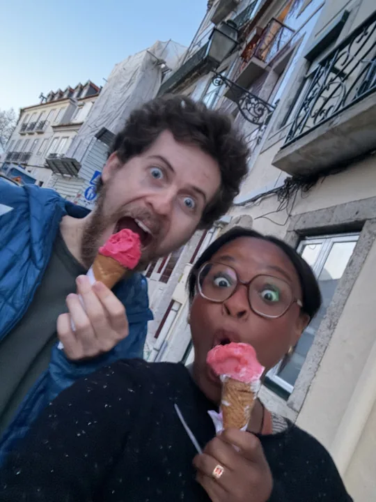 Cooper and Ciera with ice cream cones on a city street