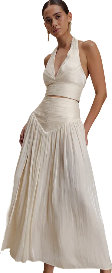 White halter crop top with a pleated maxi skirt