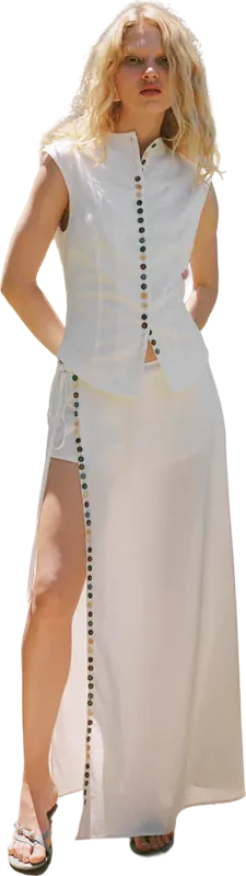 White sleeveless button vest with a long slit skirt
